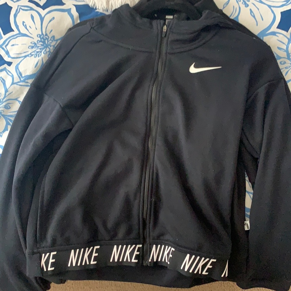 a Nike jacket, all black, size large in kids